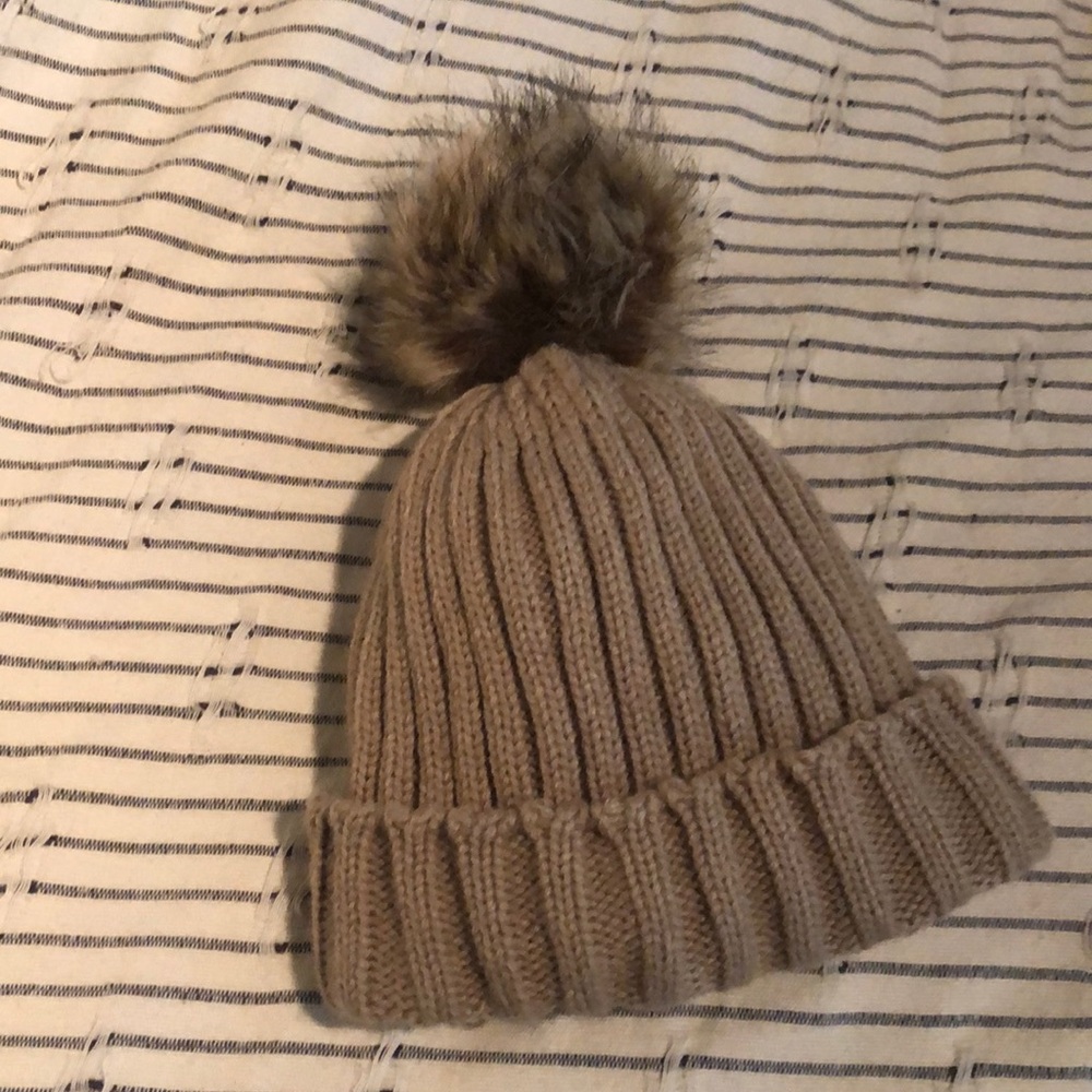 Tan ALDO hat with Pom Pom